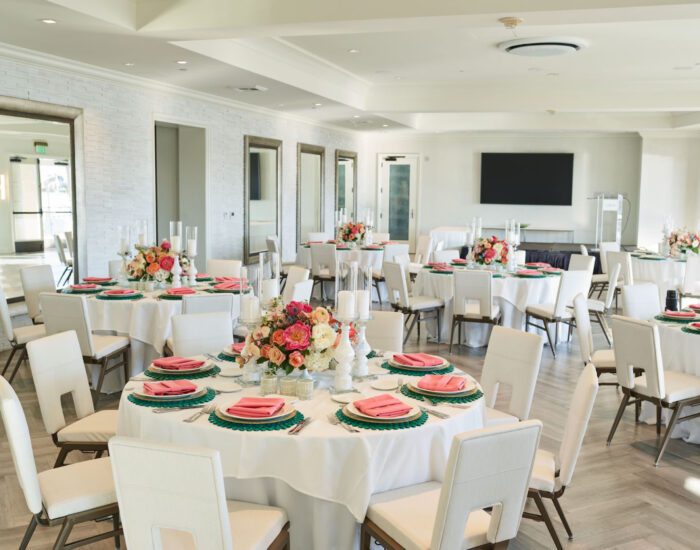 The Lighthouse room with pink and green table settings